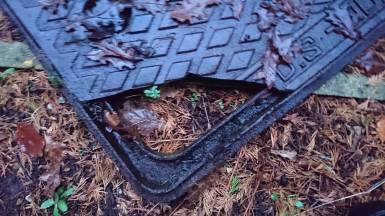 Broken manhole cover